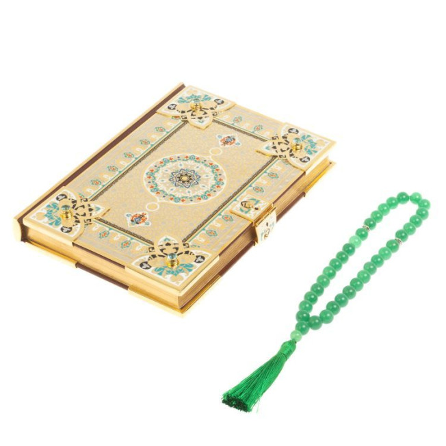 Коран на арабском языке в позолоченном окладе с четками